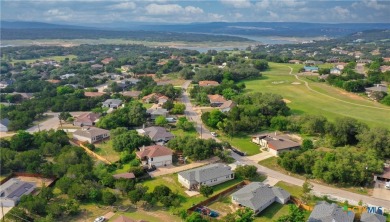 Beautiful stone-adorned home located on a huge lot in the highly on Lago Vista Golf Club in Texas - for sale on GolfHomes.com, golf home, golf lot