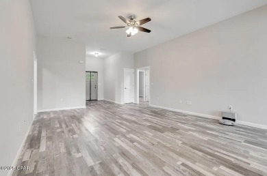 Beautiful corner lot home in Lynn Haven with detached on Panama Country Club in Florida - for sale on GolfHomes.com, golf home, golf lot