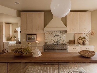 Set against the striking backdrop of the Bloomington Bluff on Bloomington Country Club in Utah - for sale on GolfHomes.com, golf home, golf lot