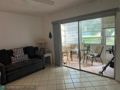 Beautiful unit 1/1 in Wynmoor 55+ won't last. First floor easy on Wynmoor Golf Course in Florida - for sale on GolfHomes.com, golf home, golf lot