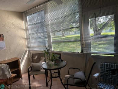 Beautiful unit 1/1 in Wynmoor 55+ won't last. First floor easy on Wynmoor Golf Course in Florida - for sale on GolfHomes.com, golf home, golf lot