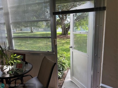 Beautiful unit 1/1 in Wynmoor 55+ won't last. First floor easy on Wynmoor Golf Course in Florida - for sale on GolfHomes.com, golf home, golf lot