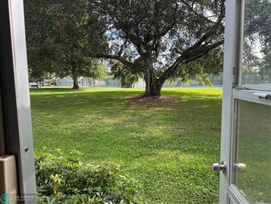 Beautiful unit 1/1 in Wynmoor 55+ won't last. First floor easy on Wynmoor Golf Course in Florida - for sale on GolfHomes.com, golf home, golf lot