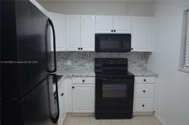 Experience serenity in this stunning 1-bedroom, 1-bathroom on Jacaranda Golf Club in Florida - for sale on GolfHomes.com, golf home, golf lot