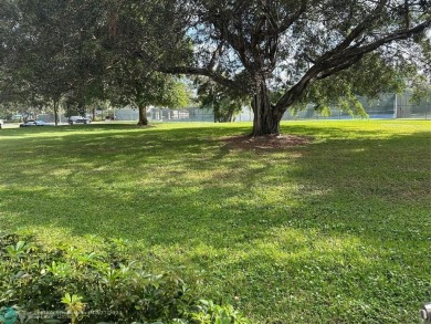 Beautiful unit 1/1 in Wynmoor 55+ won't last. First floor easy on Wynmoor Golf Course in Florida - for sale on GolfHomes.com, golf home, golf lot
