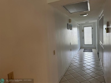 Beautiful unit 1/1 in Wynmoor 55+ won't last. First floor easy on Wynmoor Golf Course in Florida - for sale on GolfHomes.com, golf home, golf lot