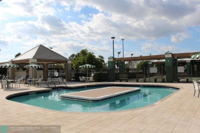 Beautiful unit 1/1 in Wynmoor 55+ won't last. First floor easy on Wynmoor Golf Course in Florida - for sale on GolfHomes.com, golf home, golf lot