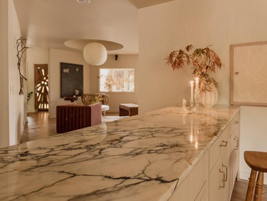 Set against the striking backdrop of the Bloomington Bluff on Bloomington Country Club in Utah - for sale on GolfHomes.com, golf home, golf lot