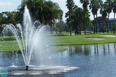 Beautiful unit 1/1 in Wynmoor 55+ won't last. First floor easy on Wynmoor Golf Course in Florida - for sale on GolfHomes.com, golf home, golf lot