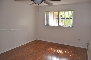 Experience serenity in this stunning 1-bedroom, 1-bathroom on Jacaranda Golf Club in Florida - for sale on GolfHomes.com, golf home, golf lot