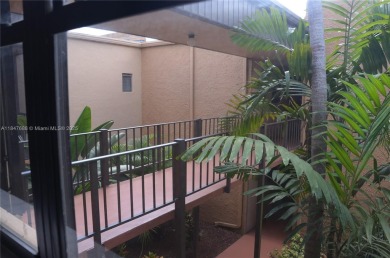 Experience serenity in this stunning 1-bedroom, 1-bathroom on Jacaranda Golf Club in Florida - for sale on GolfHomes.com, golf home, golf lot