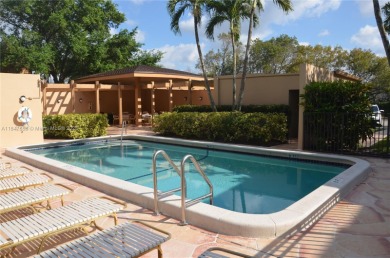 Experience serenity in this stunning 1-bedroom, 1-bathroom on Jacaranda Golf Club in Florida - for sale on GolfHomes.com, golf home, golf lot