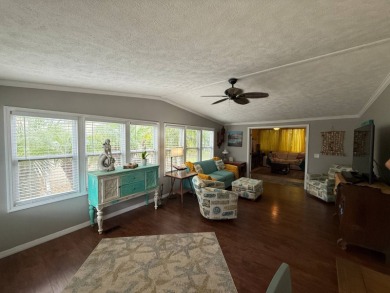 This well cared for home is being sold unfurnished.  As you on Del Tura Golf and Country Club in Florida - for sale on GolfHomes.com, golf home, golf lot
