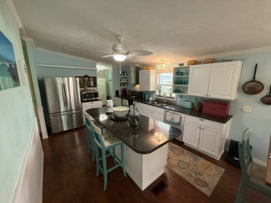 This well cared for home is being sold unfurnished.  As you on Del Tura Golf and Country Club in Florida - for sale on GolfHomes.com, golf home, golf lot