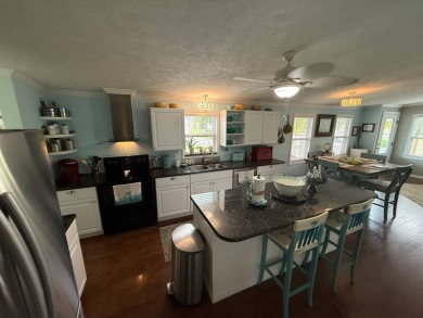This well cared for home is being sold unfurnished.  As you on Del Tura Golf and Country Club in Florida - for sale on GolfHomes.com, golf home, golf lot