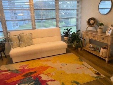Discover this beautifully maintained 2BR 2BA condo in the on Oriole Golf and Tennis Club in Florida - for sale on GolfHomes.com, golf home, golf lot