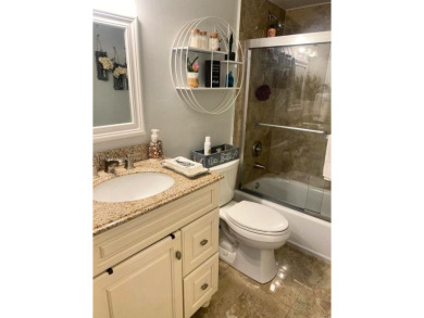 Discover this beautifully maintained 2BR 2BA condo in the on Oriole Golf and Tennis Club in Florida - for sale on GolfHomes.com, golf home, golf lot