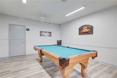 Discover this beautifully maintained 2BR 2BA condo in the on Oriole Golf and Tennis Club in Florida - for sale on GolfHomes.com, golf home, golf lot
