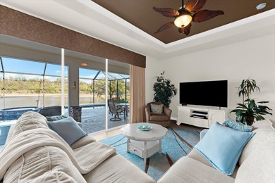 RESORT STYLE LIVING WITH STUNNING WATER VIEWS - 3BR/2BA in Gated on River Strand Golf and Country Club At Heritage Harbour  in Florida - for sale on GolfHomes.com, golf home, golf lot