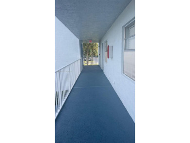 Discover this beautifully maintained 2BR 2BA condo in the on Oriole Golf and Tennis Club in Florida - for sale on GolfHomes.com, golf home, golf lot