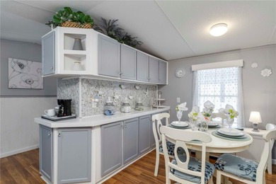 Step into a world of sun-drenched sophistication and carefree on Twin Isles Country Club in Florida - for sale on GolfHomes.com, golf home, golf lot