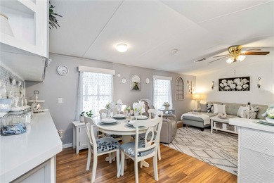 Step into a world of sun-drenched sophistication and carefree on Twin Isles Country Club in Florida - for sale on GolfHomes.com, golf home, golf lot