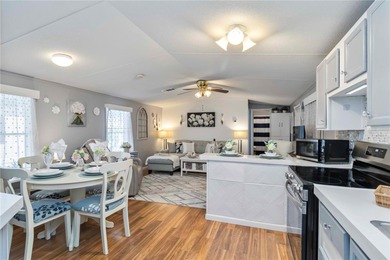 Step into a world of sun-drenched sophistication and carefree on Twin Isles Country Club in Florida - for sale on GolfHomes.com, golf home, golf lot