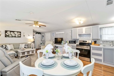 Step into a world of sun-drenched sophistication and carefree on Twin Isles Country Club in Florida - for sale on GolfHomes.com, golf home, golf lot