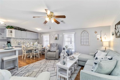 Step into a world of sun-drenched sophistication and carefree on Twin Isles Country Club in Florida - for sale on GolfHomes.com, golf home, golf lot