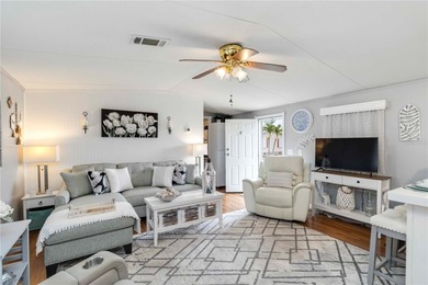 Step into a world of sun-drenched sophistication and carefree on Twin Isles Country Club in Florida - for sale on GolfHomes.com, golf home, golf lot