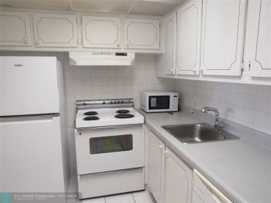 LOVELY 1/1 UNIT IN DURHAM. STEPS TO THE POOL & ACROSS  FROM OUR on Hillsboro Pines Golf in Florida - for sale on GolfHomes.com, golf home, golf lot
