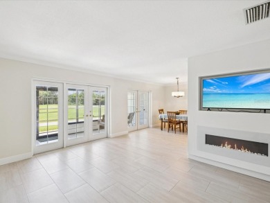Welcome to this stunning, fully renovated 4 bedroom, 2 bathroom on East Lake Woodlands Country Club in Florida - for sale on GolfHomes.com, golf home, golf lot