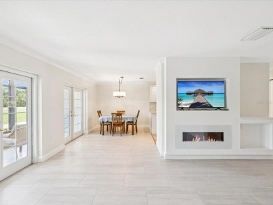 Welcome to this stunning, fully renovated 4 bedroom, 2 bathroom on East Lake Woodlands Country Club in Florida - for sale on GolfHomes.com, golf home, golf lot