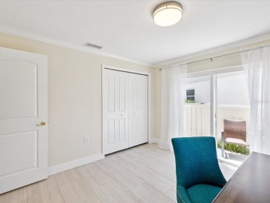 Welcome to this stunning, fully renovated 4 bedroom, 2 bathroom on East Lake Woodlands Country Club in Florida - for sale on GolfHomes.com, golf home, golf lot