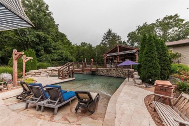 Step into an extraordinary property that offers more than just a on Fox Run Golf Club in Missouri - for sale on GolfHomes.com, golf home, golf lot