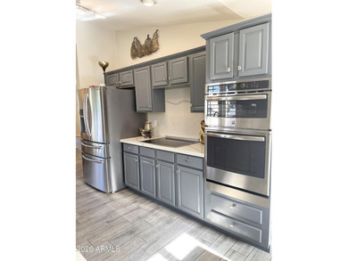 This Elegant + Spacious home has it ALL ! Enter into a Modern on Westbrook Village Golf Club in Arizona - for sale on GolfHomes.com, golf home, golf lot