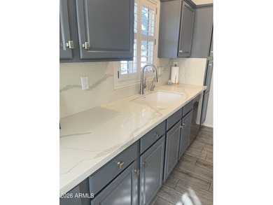 This Elegant + Spacious home has it ALL ! Enter into a Modern on Westbrook Village Golf Club in Arizona - for sale on GolfHomes.com, golf home, golf lot