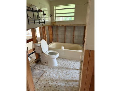 INVESTOR SPECIAL! 2 bedroom, 2 bathroom, 1 car garage home in on Sea Pines Golf Club in Florida - for sale on GolfHomes.com, golf home, golf lot