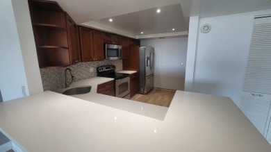 Location, Location, Location! This beautifully updated 2-bedroom on The President Country Club in Florida - for sale on GolfHomes.com, golf home, golf lot