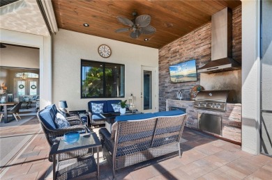 Luxury waterfront living awaits in this custom residence located on Twin Isles Country Club in Florida - for sale on GolfHomes.com, golf home, golf lot