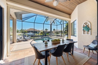 Luxury waterfront living awaits in this custom residence located on Twin Isles Country Club in Florida - for sale on GolfHomes.com, golf home, golf lot