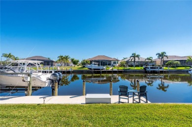 Luxury waterfront living awaits in this custom residence located on Twin Isles Country Club in Florida - for sale on GolfHomes.com, golf home, golf lot