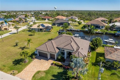 Luxury waterfront living awaits in this custom residence located on Twin Isles Country Club in Florida - for sale on GolfHomes.com, golf home, golf lot