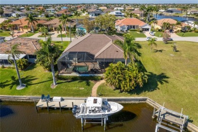 Luxury waterfront living awaits in this custom residence located on Twin Isles Country Club in Florida - for sale on GolfHomes.com, golf home, golf lot