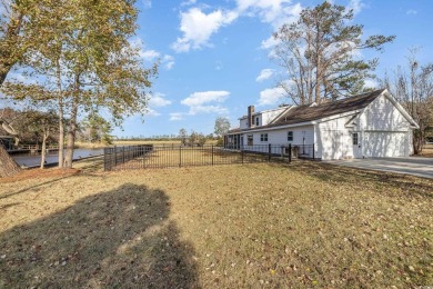 Have you been searching for a home that has access to deep water on Wedgefield Plantation Golf Club in South Carolina - for sale on GolfHomes.com, golf home, golf lot