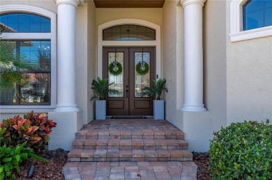 Luxury waterfront living awaits in this custom residence located on Twin Isles Country Club in Florida - for sale on GolfHomes.com, golf home, golf lot