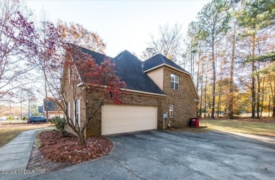 Welcome to this beautiful two-story all-brick home, located in on Barrington Hall Golf Course in Georgia - for sale on GolfHomes.com, golf home, golf lot