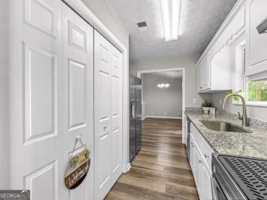Welcome to this charming well maintained 3-bed, 2-bath move-in on Turtle Cove Golf Course in Georgia - for sale on GolfHomes.com, golf home, golf lot