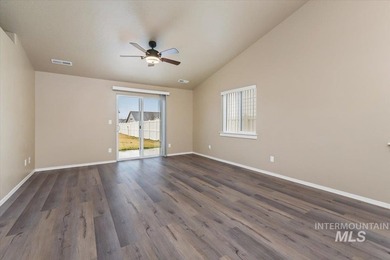 This inviting home features soaring vaulted ceilings upgraded on Hunters Point Golf Club in Idaho - for sale on GolfHomes.com, golf home, golf lot