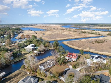 Have you been searching for a home that has access to deep water on Wedgefield Plantation Golf Club in South Carolina - for sale on GolfHomes.com, golf home, golf lot